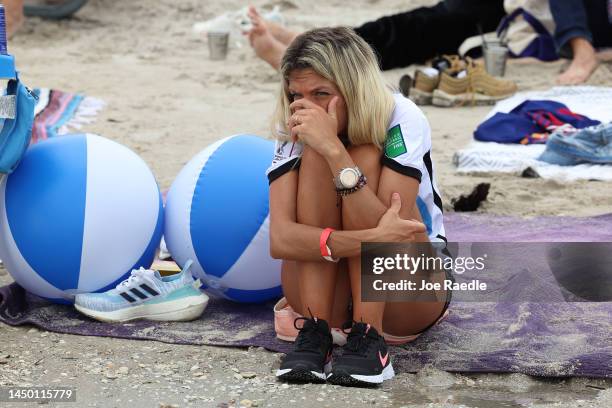 An Argentina soccer fan watches as her team plays against France during the Haig Club’s Stadium in the Sand Ballyhoo Media World Cup watch party at...