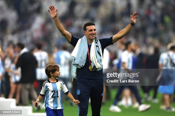 Lionel Scaloni, Head Coach of Argentina, celebrates with his children after the FIFA World Cup Qatar 2022 Final match between Argentina and France at...