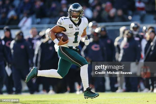 Jalen Hurts of the Philadelphia Eagles runs the ball for a touchdown during the second quarter in the game against the Chicago Bears at Soldier Field...