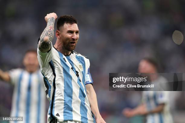 Lionel Messi of Argentina celebrates after scoring the team's third goal during the FIFA World Cup Qatar 2022 Final match between Argentina and...