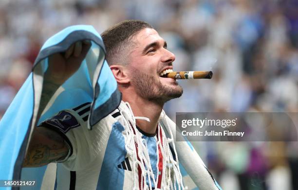 Rodrigo De Paul of Argentina celebrates with a cigar after the win during the FIFA World Cup Qatar 2022 Final match between Argentina and France at...
