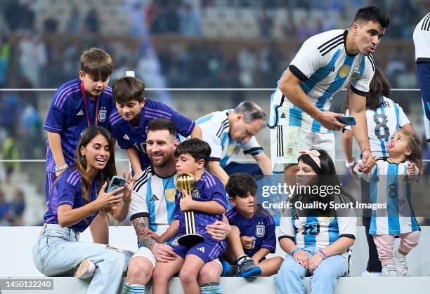 Lionel Messi of Argentina celebrates with his family after the FIFA World Cup Qatar 2022 Final match between Argentina and France at Lusail Stadium...