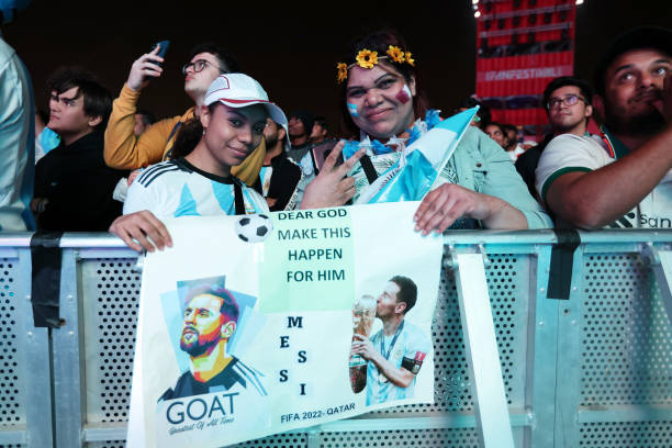 Fans of Argentina celebrate during the FIFA World Cup 2022 Qatar Fan Festival at Al Bidda Park on December 18, 2022 in Doha, Qatar.