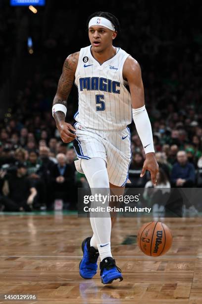 Paolo Banchero of the Orlando Magic dribbles the ball against the Boston Celtics during the first quarter at the TD Garden on December 18, 2022 in...