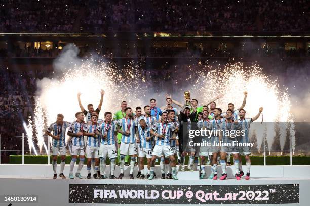 Lionel Messi of Argentina lifts the FIFA World Cup Qatar 2022 Winner's Trophy during the FIFA World Cup Qatar 2022 Final match between Argentina and...