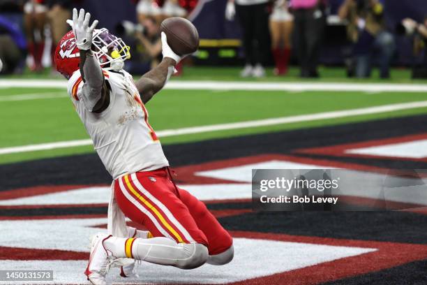 Jerick McKinnon of the Kansas City Chiefs celebrates a 2-point conversion during the fourth quarter against the Houston Texans at NRG Stadium on...