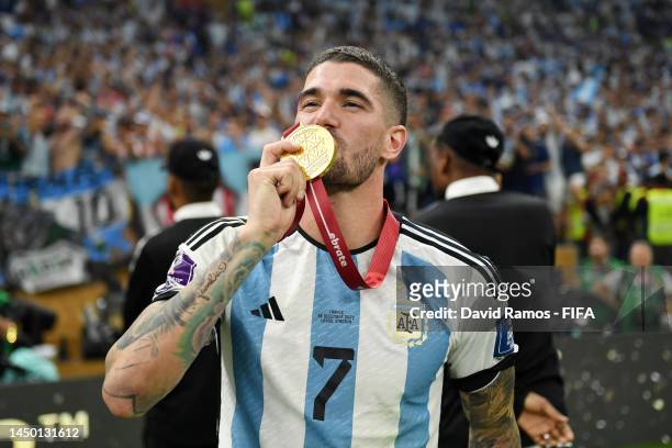 Rodrigo De Paul of Argentina poses for a photo with their FIFA World Cup Qatar 2022 Winners Medal following the FIFA World Cup Qatar 2022 Final match...