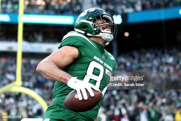 Uzomah of the New York Jets celebrates a touchdown during the second half against the Detroit Lions at MetLife Stadium on December 18, 2022 in East...