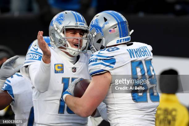 Brock Wright and Jared Goff of the Detroit Lions celebrates a touchdown during the fourth quarter against the New York Jets at MetLife Stadium on...