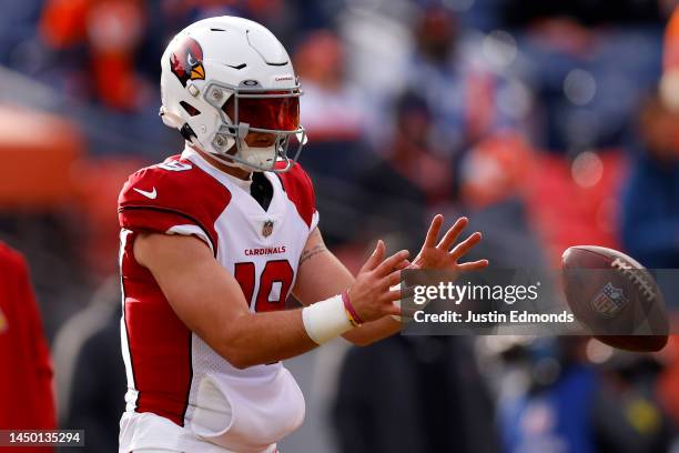 Trace McSorley of the Arizona Cardinals warms up prior to the game agaisnt the Denver Broncos at Empower Field At Mile High on December 18, 2022 in...