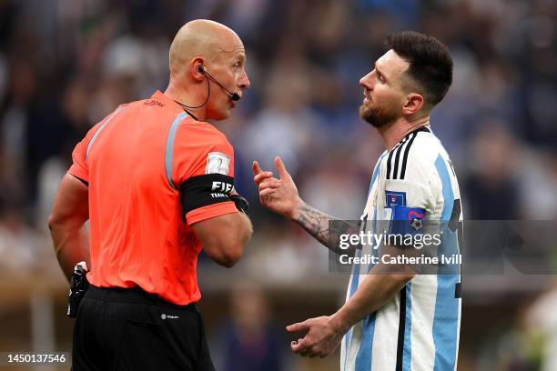 Lionel Messi of Argentina protests to Referee Szymon Marciniak during the FIFA World Cup Qatar 2022 Final match between Argentina and France at...