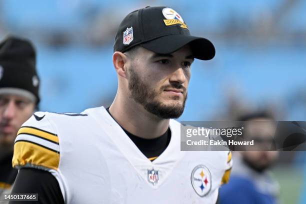 Mitch Trubisky of the Pittsburgh Steelers walks off the field after defeating the Carolina Panthers at Bank of America Stadium on December 18, 2022...