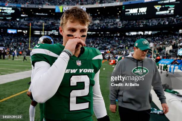 Zach Wilson of the New York Jets reacts after a game against the Detroit Lions at MetLife Stadium on December 18, 2022 in East Rutherford, New Jersey.