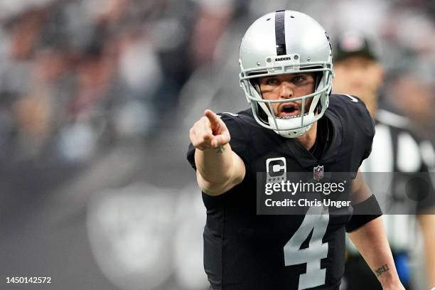 Derek Carr of the Las Vegas Raiders reacts at the line of scrimmage during the first quarter against the New England Patriots at Allegiant Stadium on...