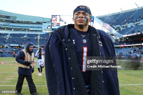 Justin Fields of the Chicago Bears on the field after a loss to the Philadelphia Eagles at Soldier Field on December 18, 2022 in Chicago, Illinois.