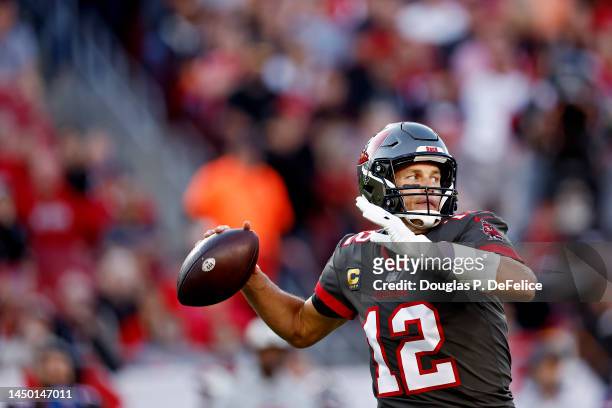 Tom Brady of the Tampa Bay Buccaneers throws the ball during the first quarter in the game against the Cincinnati Bengals at Raymond James Stadium on...
