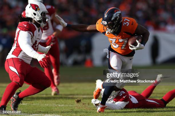 Marlon Mack of the Denver Broncos runs the ball during the first quarter in the game against the Arizona Cardinals at Empower Field At Mile High on...