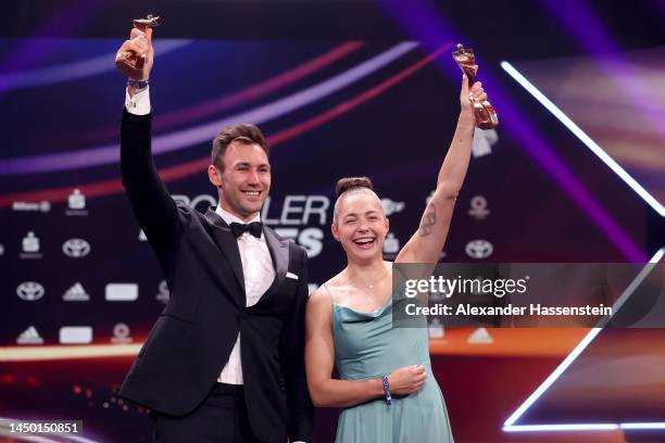 Gina Lueckenkemper and Niklas Kaul pose with their Sportsman and Sportswoman of the Year awards during the "Sportler des Jahres" Award 2022 at...