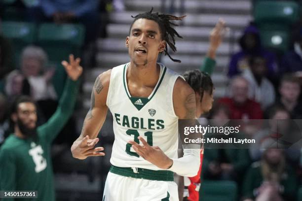 Emoni Bates of the Eastern Michigan Eagles celebrates a three point shot in the second half during a college basketball game against the Detroit...