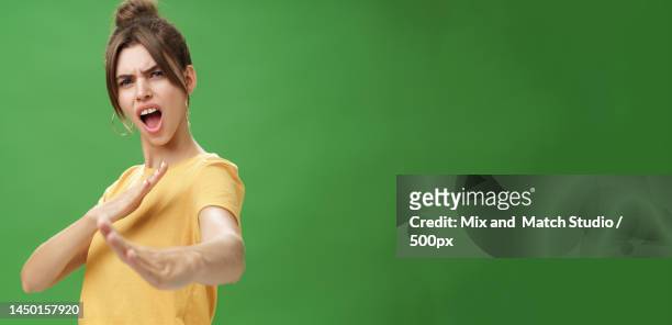 not mess with this girl portrait of funny and emotive charismatic - karate girl isolated stock pictures, royalty-free photos & images