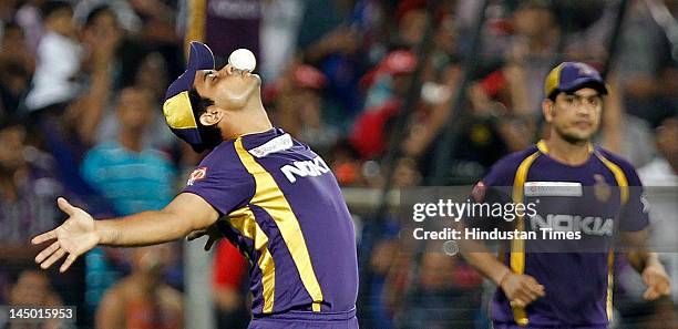 Kolkata Knight Riders player Rajat Bhatia celebrates after catch of Delhi Daredevils batsman Venu Gopal Rao during the first qualifier of IPL 5 on...