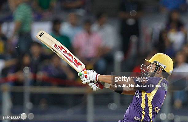Kolkata Knight Riders captain Goutam Gambhir plays a shot against Delhi Daredevils during the first qualifier on May 22, 2012 in Pune, India. Chasing...