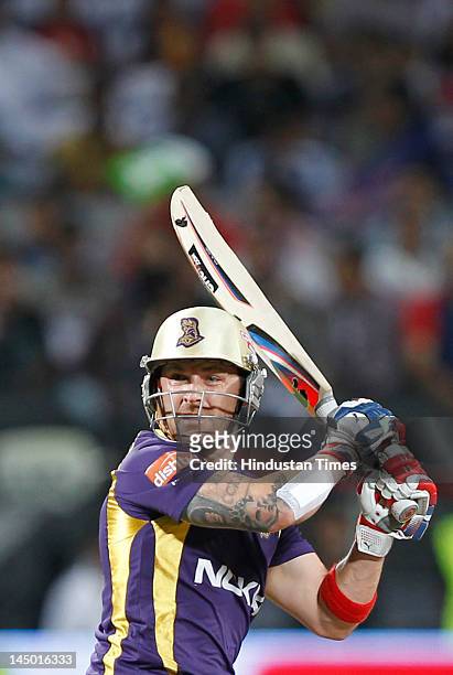 Kolkata Knight Riders batsman Brendon McCullum plays a shot against Delhi Daredevils during the first qualifier on May 22, 2012 in Pune, India....