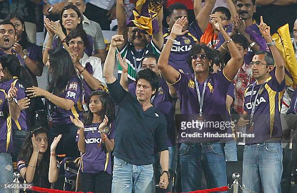 Kolkata Knight Riders co-owner Shah Rukh Khan with his daughter Suhana and actor Chunky Pandey cheer for his team against Delhi Daredevils during the...