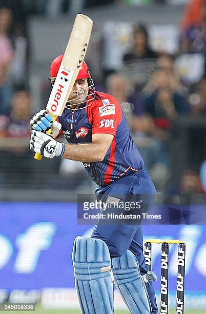 Delhi Daredevils batsman Virender Sehwag plays a shot against Kolkata Knight Riders during the first qualifier on May 22, 2012 in Pune, India....