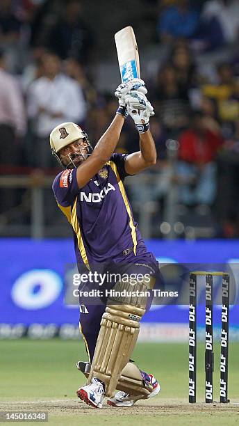 Kolkata Knight Riders batsman Yusuf Pathan plays a shot against Delhi Daredevils during the first qualifier on May 22, 2012 in Pune, India. Chasing...