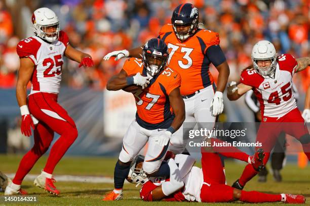 Marlon Mack of the Denver Broncos runs the ball during the first quarter in the game against the Arizona Cardinals at Empower Field At Mile High on...