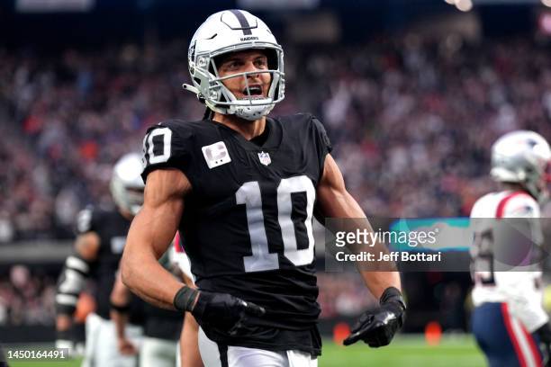 Mack Hollins of the Las Vegas Raiders celebrates a touchdown during the second quarter against the New England Patriots at Allegiant Stadium on...