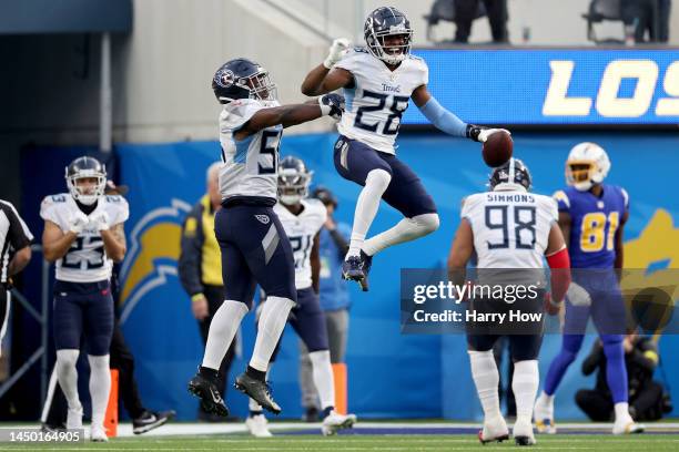 Joshua Kalu of the Tennessee Titans celebrates after an interception against the Los Angeles Chargers during the second quarter of the game at SoFi...