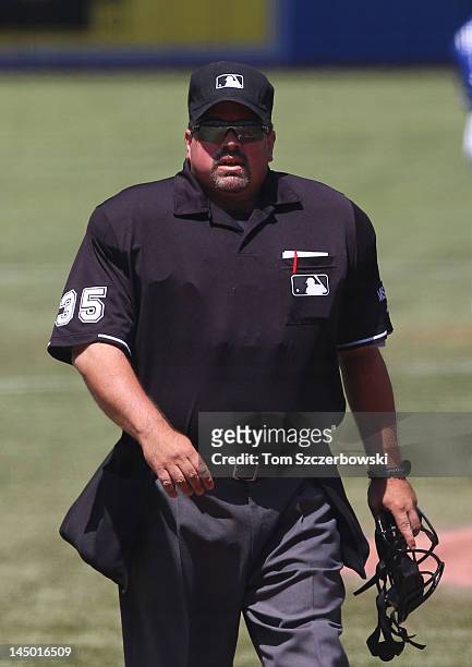 Home plate umpire Wally Bell during MLB game action between the New York Mets and the Toronto Blue Jays on May 20, 2012 at Rogers Centre in Toronto,...