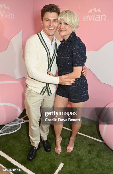 Oliver Cheshire and Pixie Lott pose in the evian VIP Suite on day one of Wimbledon 2023 on July 3, 2023 in London, England.