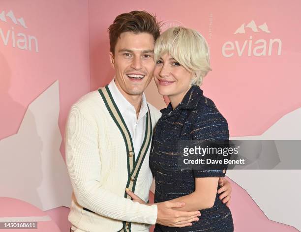 Oliver Cheshire and Pixie Lott pose in the evian VIP Suite on day one of Wimbledon 2023 on July 3, 2023 in London, England.