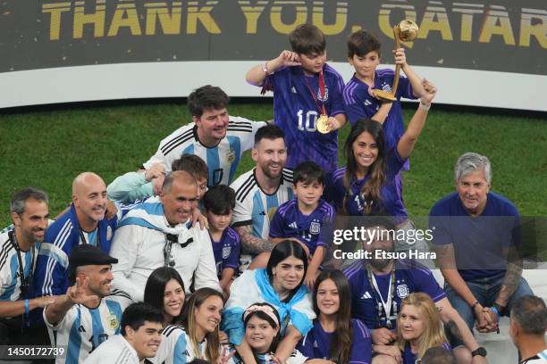 Lionel Messi of Argentina celebrates the victory with his family after the FIFA World Cup Qatar 2022 Final match between Argentina and France at...