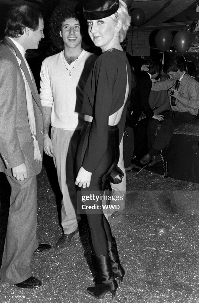 Guests attend a New Year's Eve party at Studio 54 in New York City ...