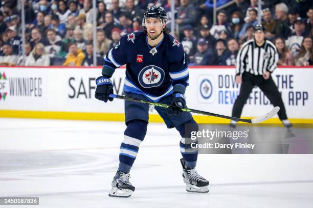 Brenden Dillon of the Winnipeg Jets keeps an eye on the play during first period action against the Nashville Predators at the Canada Life Centre on...