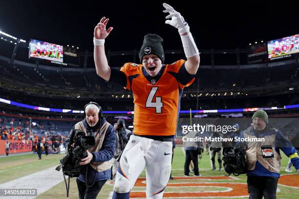 Brett Rypien of the Denver Broncos walks off the field after a win over the Arizona Cardinals at Empower Field At Mile High on December 18, 2022 in...