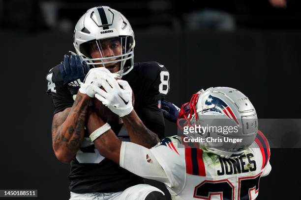 Keelan Cole of the Las Vegas Raiders catches a touchdown pass against the New England Patriots during the fourth quarter of the game at Allegiant...