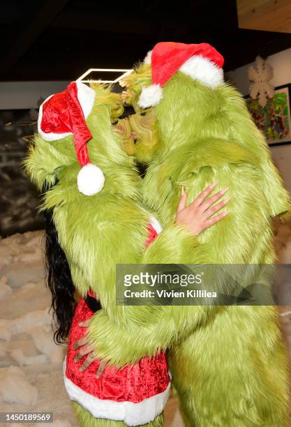 Skye Morales and Trippie Redd attend the Trippie Redd Toy Drive and meet & greet on December 18, 2022 in Los Angeles, California.