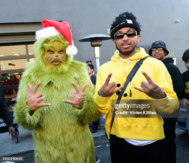 Trippie Redd and DDG attend the Trippie Redd Toy Drive and meet & greet on December 18, 2022 in Los Angeles, California.