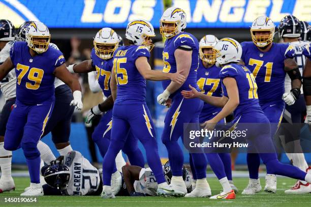 Cameron Dicker of the Los Angeles Chargers celebrates a field goal in the fourth quarter of the game against the Tennessee Titans at SoFi Stadium on...