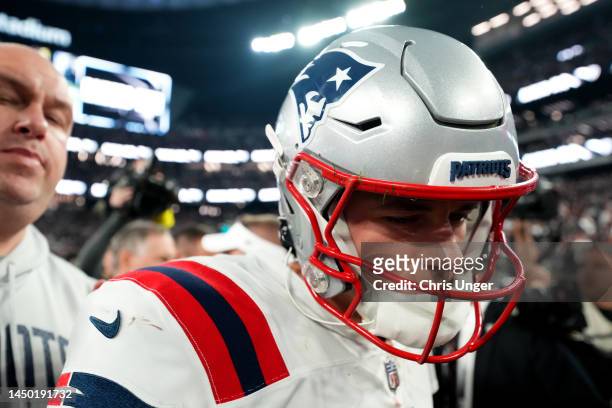 Mac Jones of the New England Patriots reacts after a game against the Las Vegas Raiders at Allegiant Stadium on December 18, 2022 in Las Vegas,...