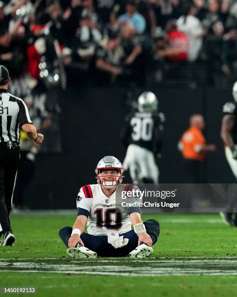 Mac Jones of the New England Patriots reacts after losing to the Las Vegas Raiders at Allegiant Stadium on December 18, 2022 in Las Vegas, Nevada.