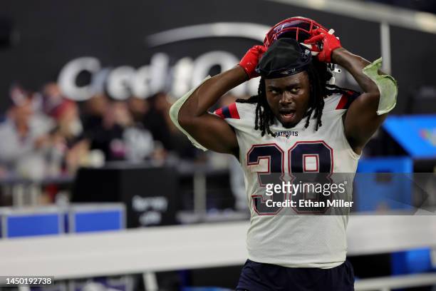 Rhamondre Stevenson of the New England Patriots reacts after a game against the Las Vegas Raiders at Allegiant Stadium on December 18, 2022 in Las...