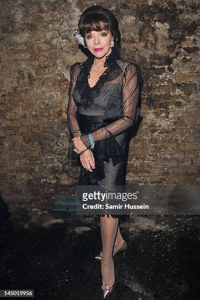 Joan Collins arrives at "A Night Out With The Millennium Network" at the Old Vic Tunnels, presented by The Clinton Foundations and The Reuben...
