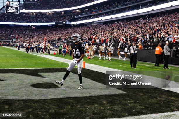 Keelan Cole of the Las Vegas Raiders celebrates after scoring the tying touchdown during an NFL football game between the Las Vegas Raiders and the...