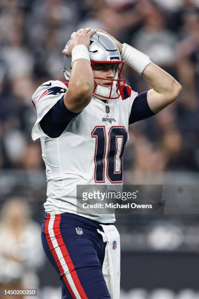 Mac Jones of the New England Patriots reacts during an NFL football game between the Las Vegas Raiders and the New England Patriots at Allegiant...